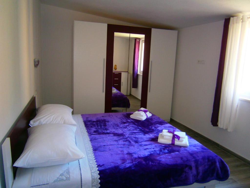 Postel nebo postele na pokoji v ubytování Apartment Willy