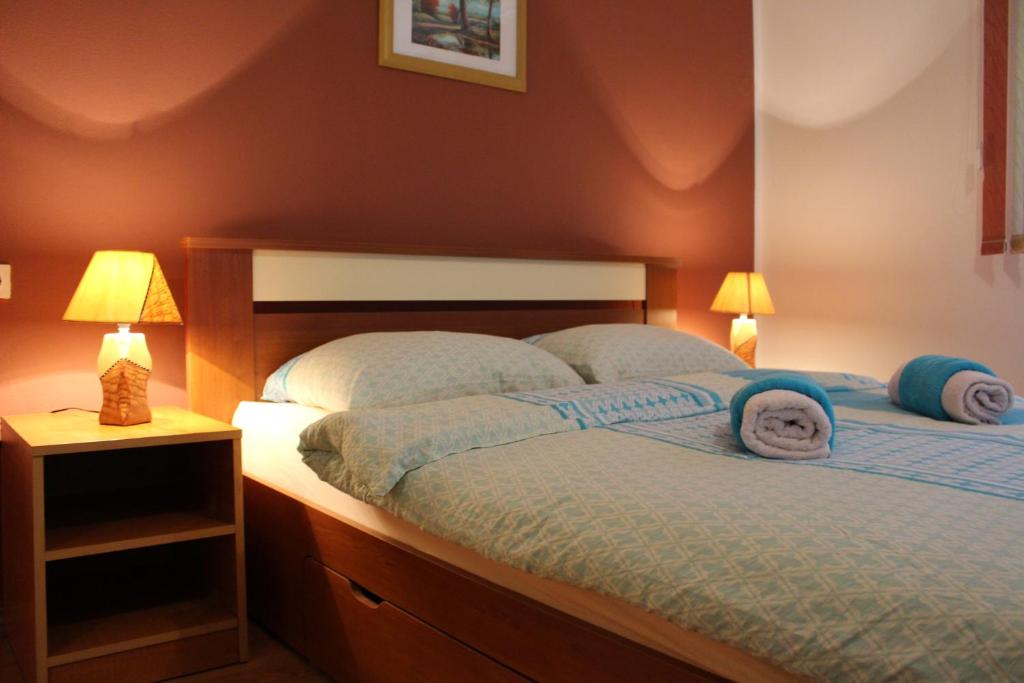 Posteľ alebo postele v izbe v ubytovaní Apartment Paula