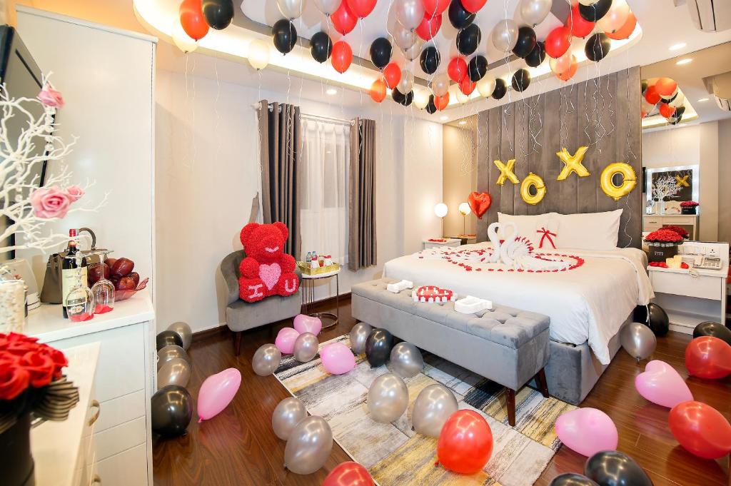 Postel nebo postele na pokoji v ubytování Adora Hotel