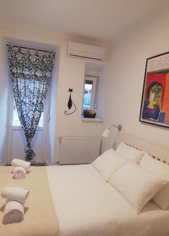 Postel nebo postele na pokoji v ubytování Amalia Apartments
