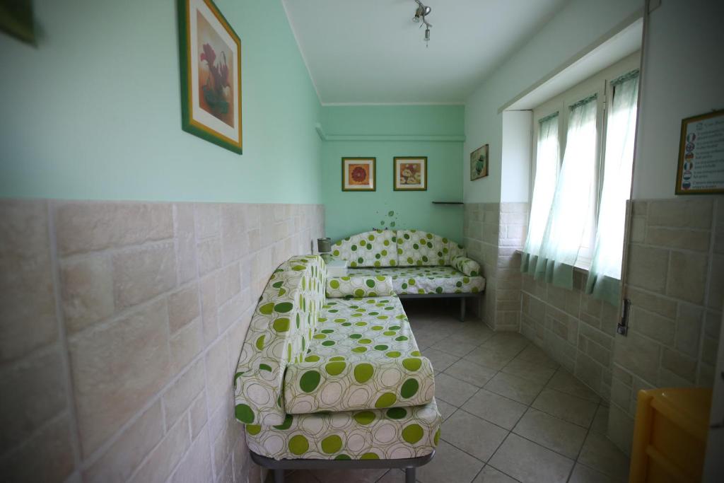 Postel nebo postele na pokoji v ubytování Casa Fusco