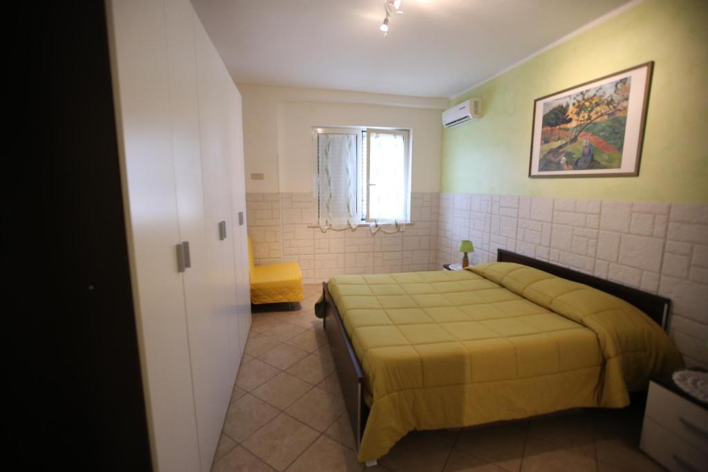 Postel nebo postele na pokoji v ubytování Casa Fusco
