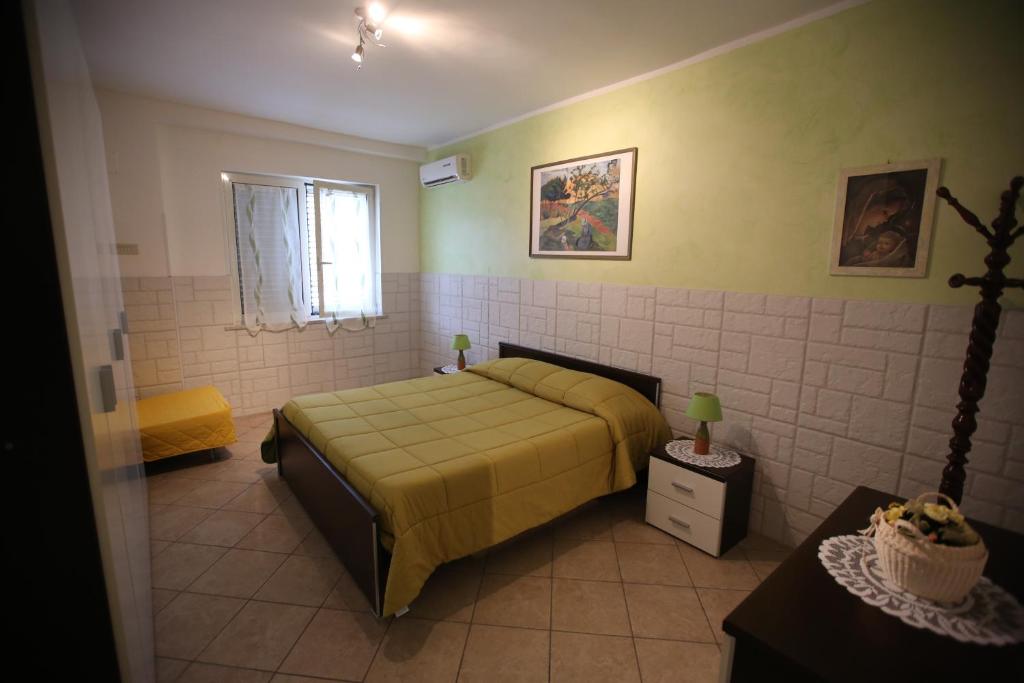 Postel nebo postele na pokoji v ubytování Casa Fusco
