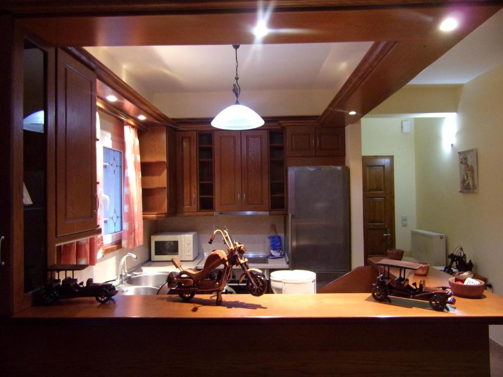 Kuchyň nebo kuchyňský kout v ubytování George's Apartment