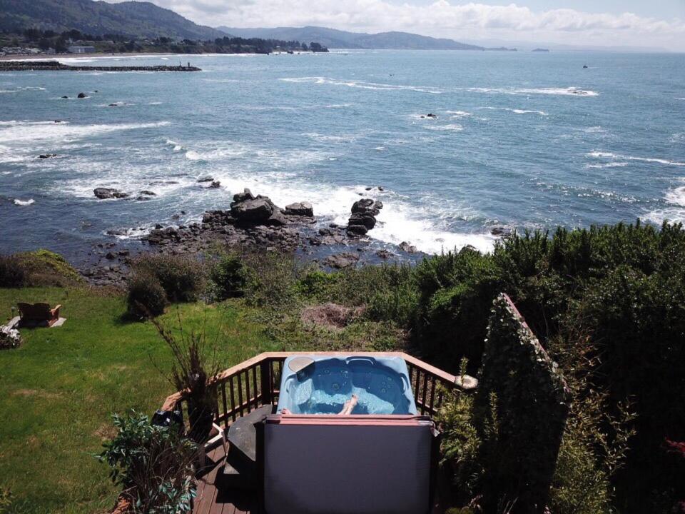 a person riding in a boat on the ocean at Mermaid's Muse Bed and Breakfast in Brookings