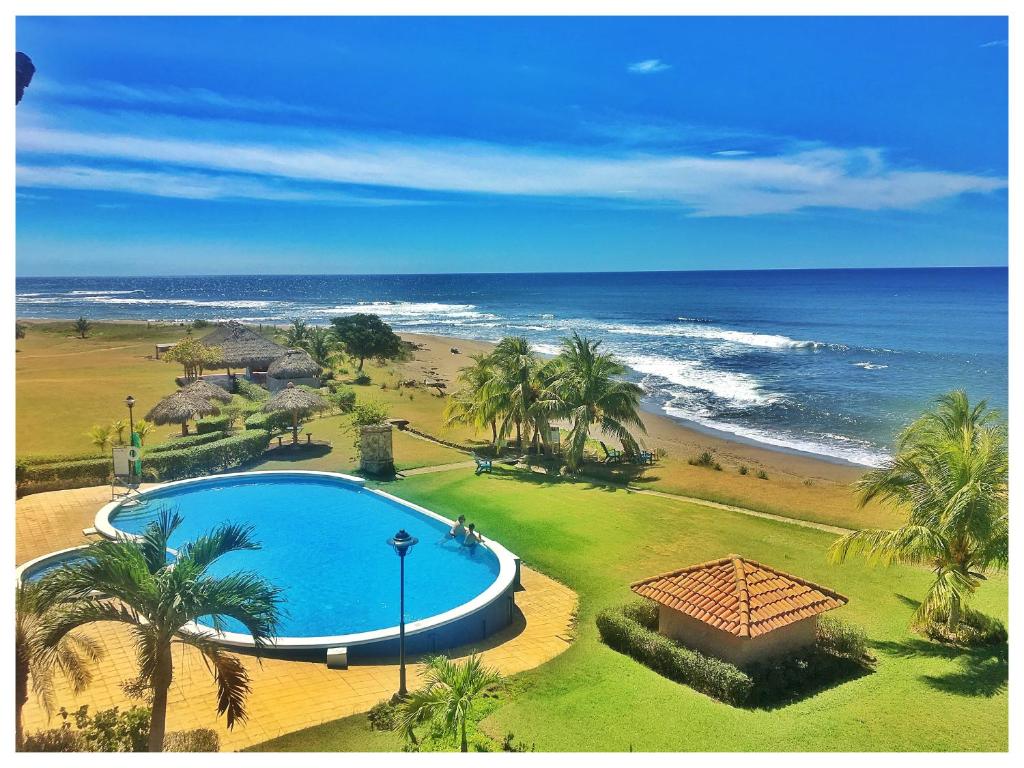 an overhead view of a swimming pool and the beach at Suite San Juan 133 Gran Pacifica Resort in San Diego