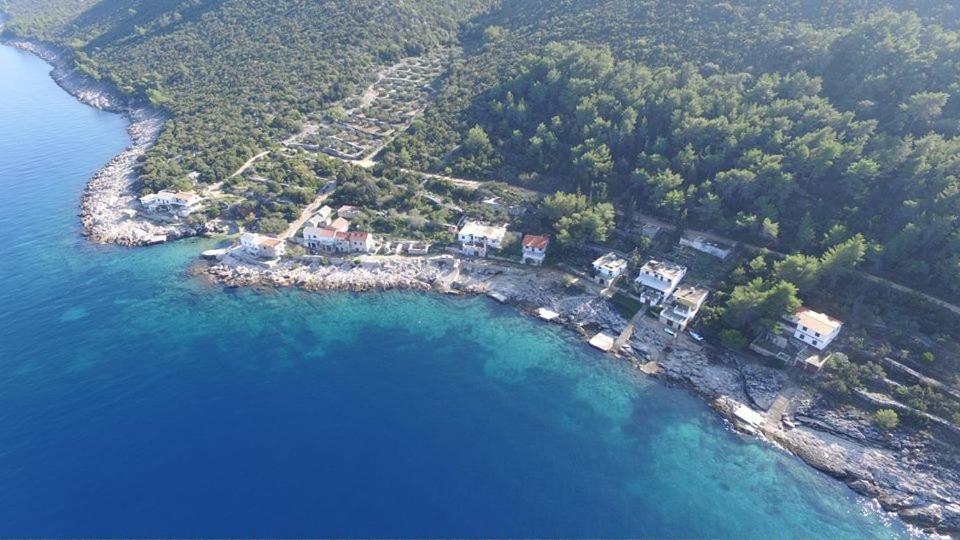 an aerial view of an island in the ocean at Crni in Gdinj