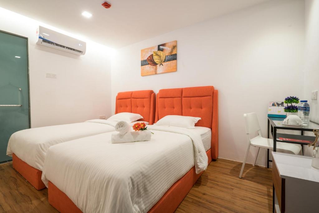 Postel nebo postele na pokoji v ubytování My Sj Hotel