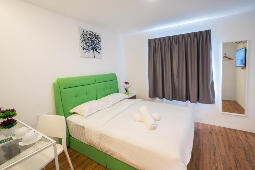 Postel nebo postele na pokoji v ubytování My Sj Hotel