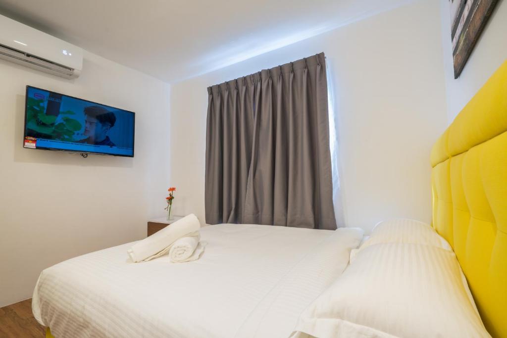 Postel nebo postele na pokoji v ubytování My Sj Hotel