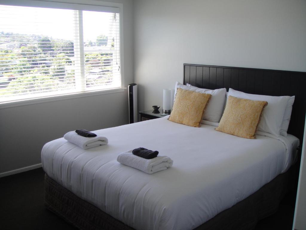 Postel nebo postele na pokoji v ubytování Kiwi House Waiheke