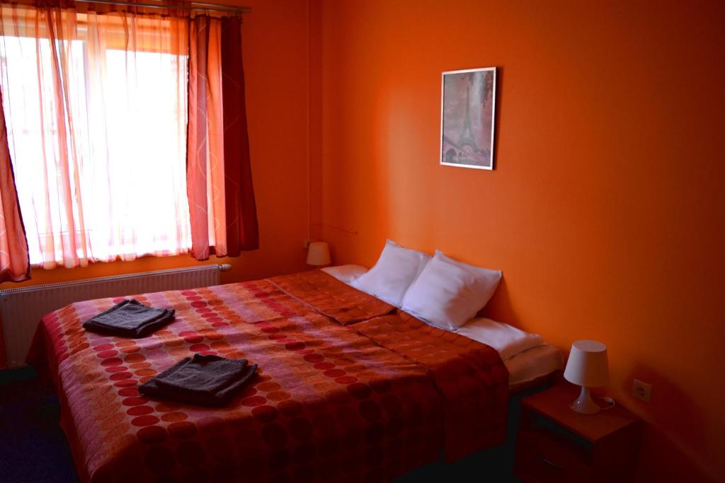 Postel nebo postele na pokoji v ubytování Jeruzale Hotel