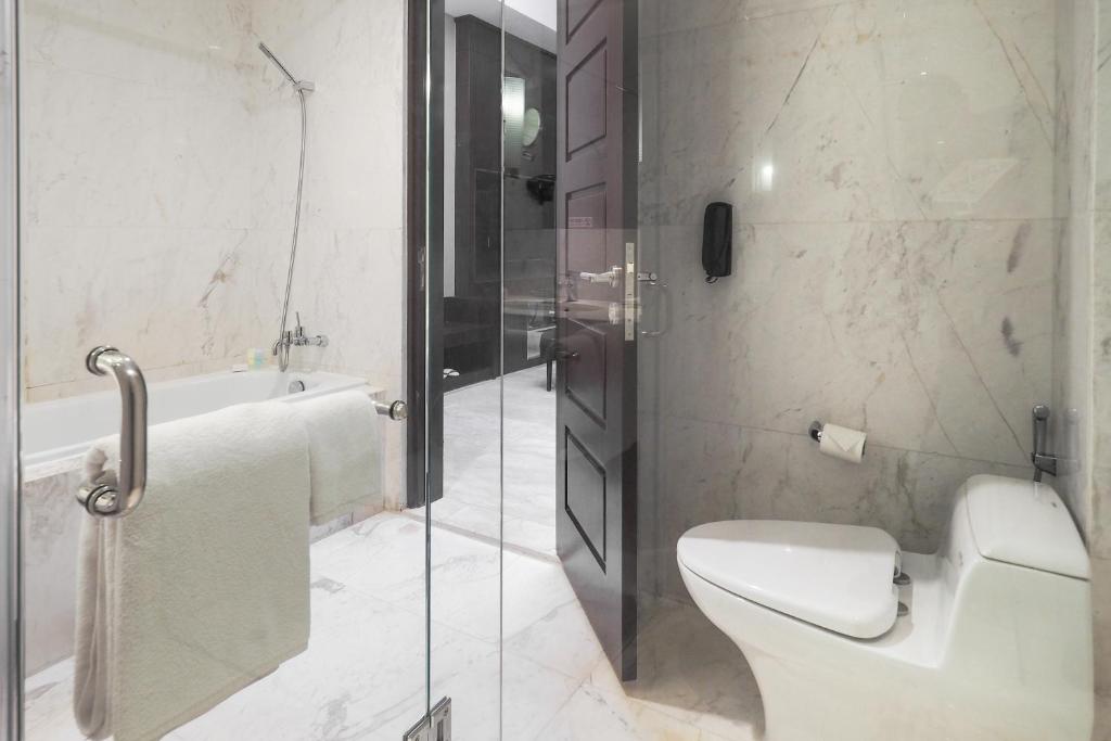 Grand Mercure Solo Baru - Camera Suite Executive Con Un Letto King King