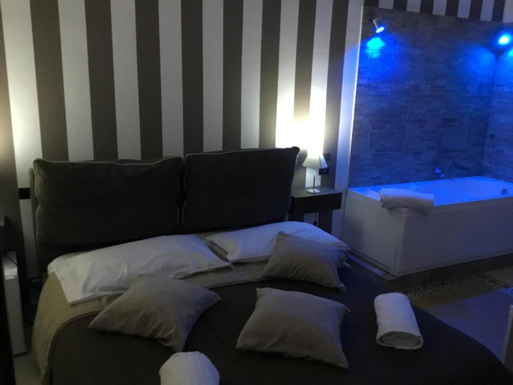 Letto o letti in una camera di Alba Camere