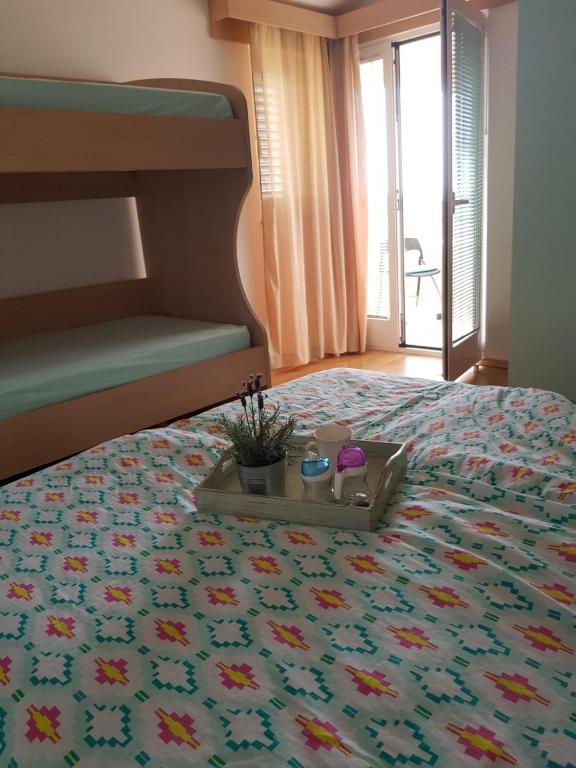 Postel nebo postele na pokoji v ubytování Apartmani Bambi