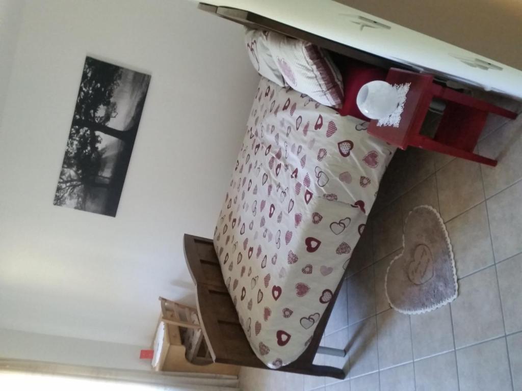 Postel nebo postele na pokoji v ubytování B&B RAINA