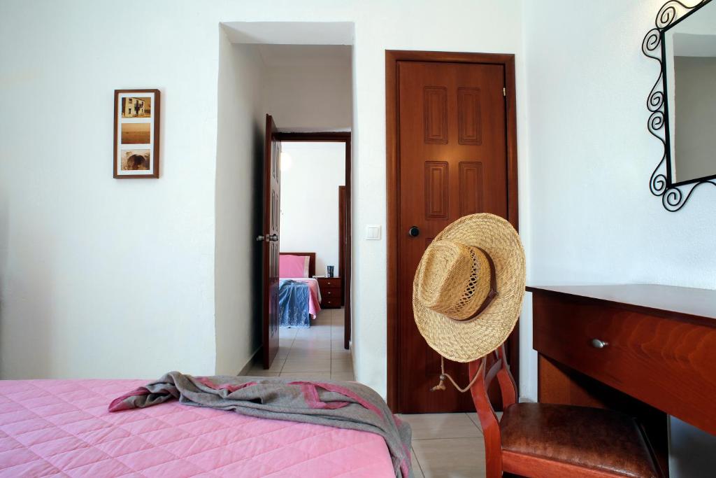 Postel nebo postele na pokoji v ubytování Stratos Hotel
