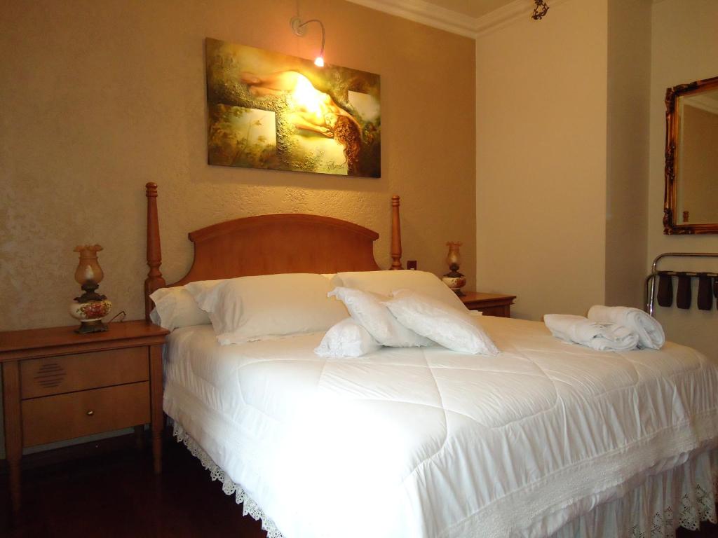 Postel nebo postele na pokoji v ubytování Hotel Pousada Florença