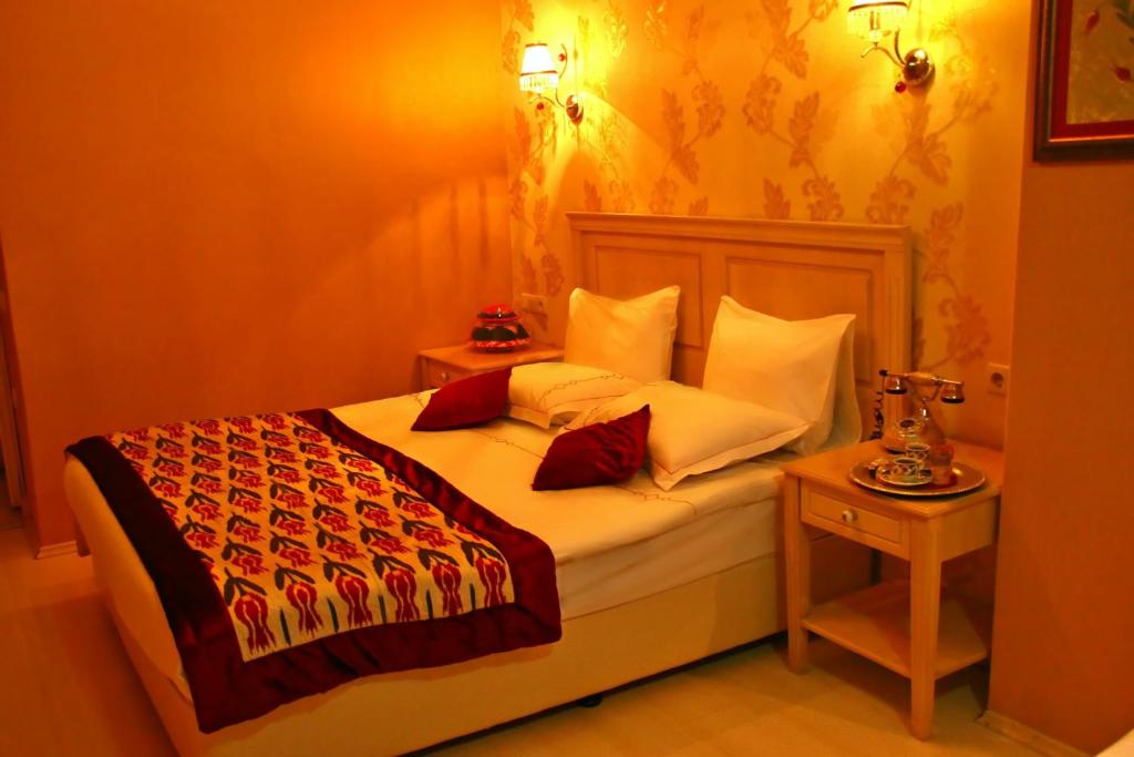 Postel nebo postele na pokoji v ubytování Divas Hotel