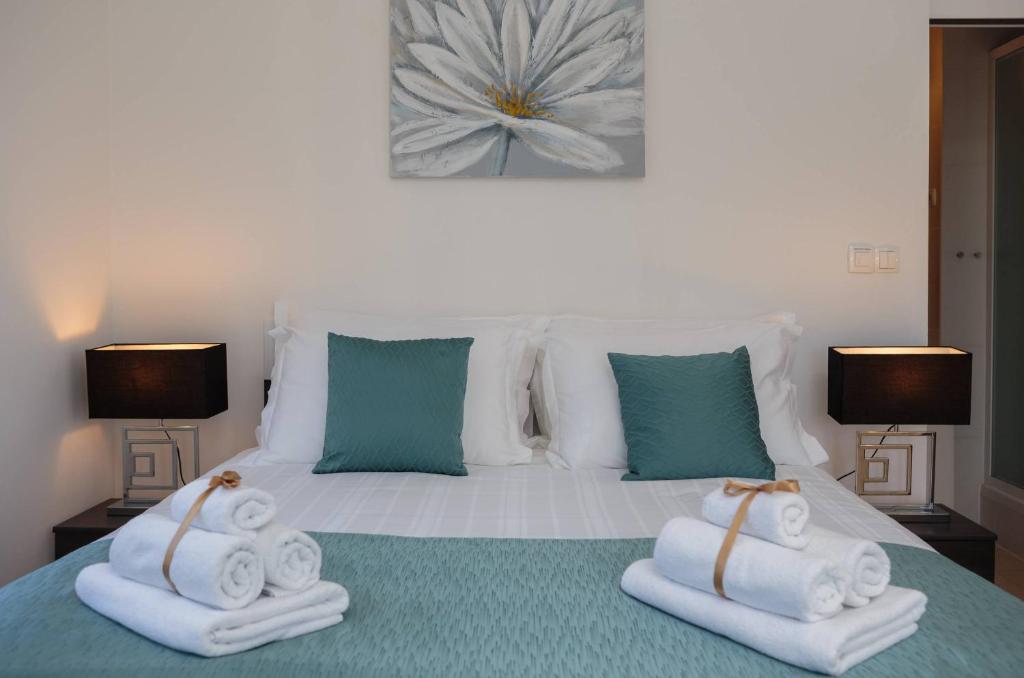 Posteľ alebo postele v izbe v ubytovaní Apartments CenterLink