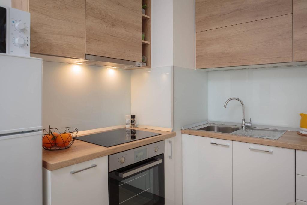 Kuchyňa alebo kuchynka v ubytovaní Apartments CenterLink
