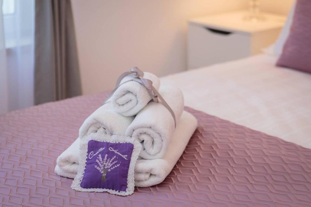 Posteľ alebo postele v izbe v ubytovaní Apartments CenterLink