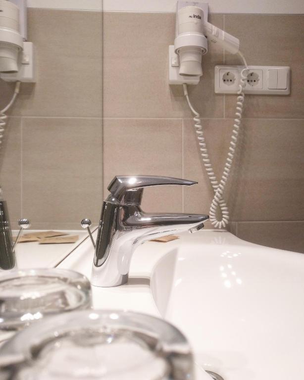 Koupelna v ubytování Hotel Pension Schweitzer