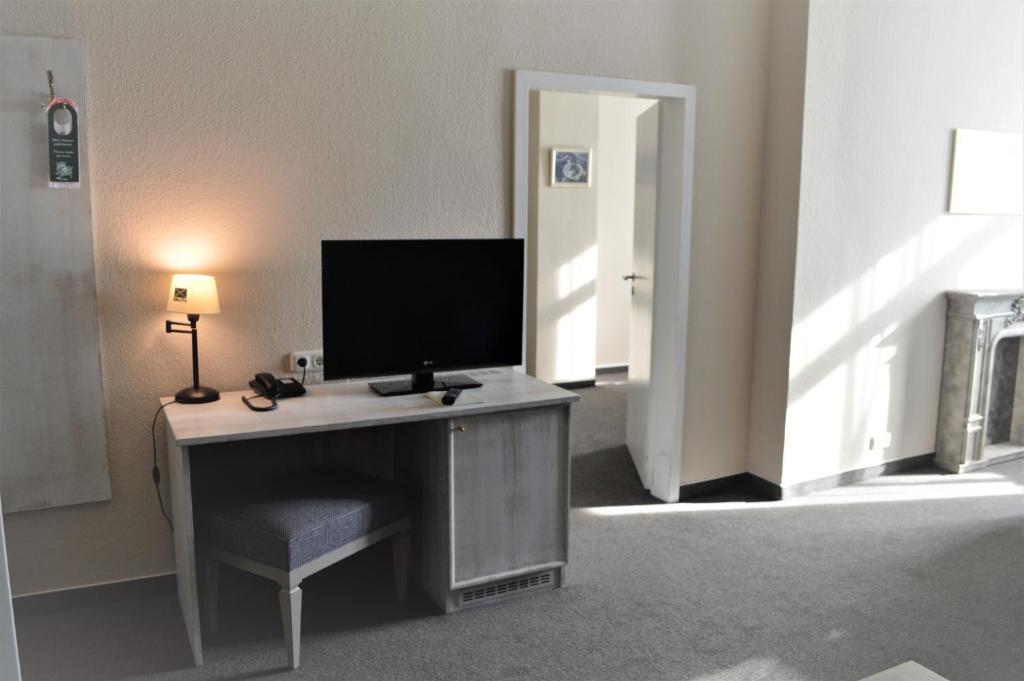 TV a/nebo společenská místnost v ubytování Inselhotel Langeoog