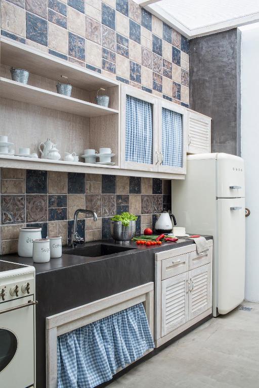 Kuchyň nebo kuchyňský kout v ubytování Melograno Villas