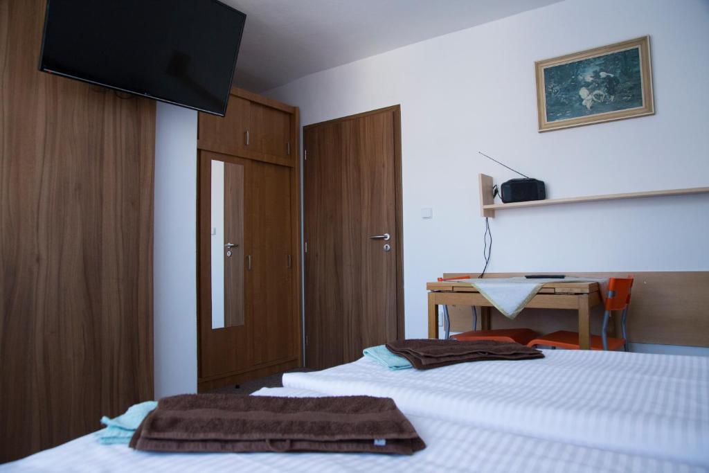 Postel nebo postele na pokoji v ubytování Penzion Beta
