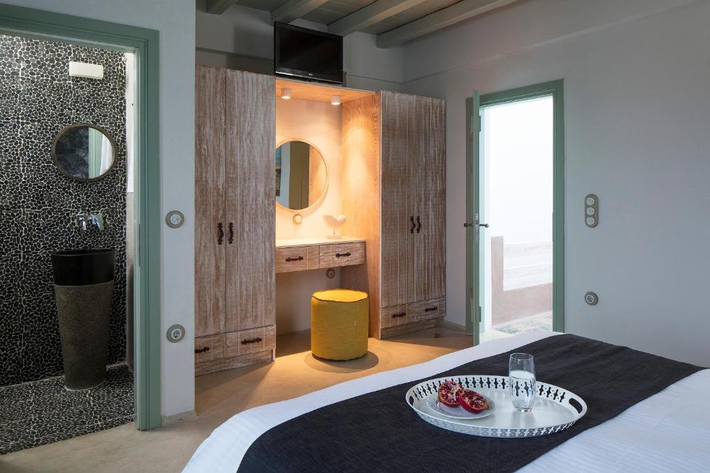 Postel nebo postele na pokoji v ubytování Melograno Villas