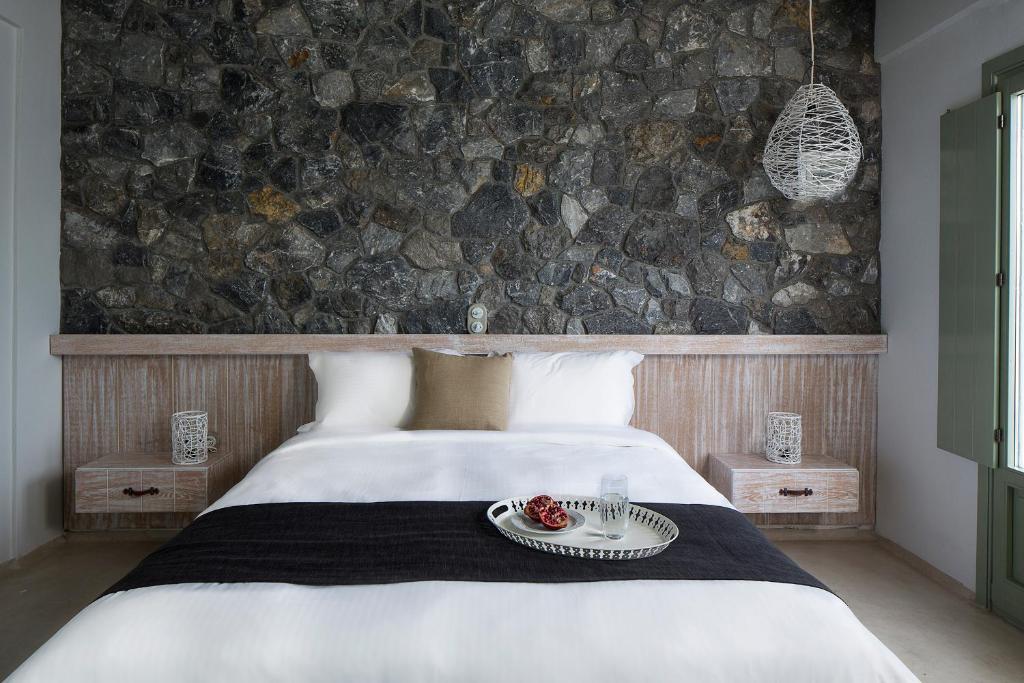 Postel nebo postele na pokoji v ubytování Melograno Villas