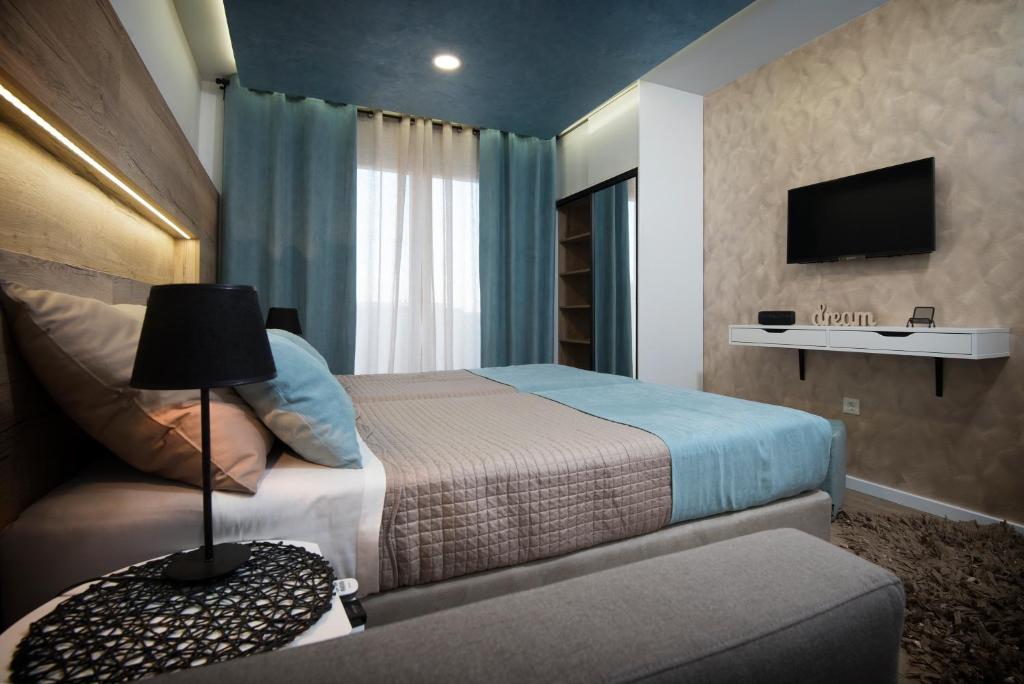 TV a/nebo společenská místnost v ubytování Guest House Laura