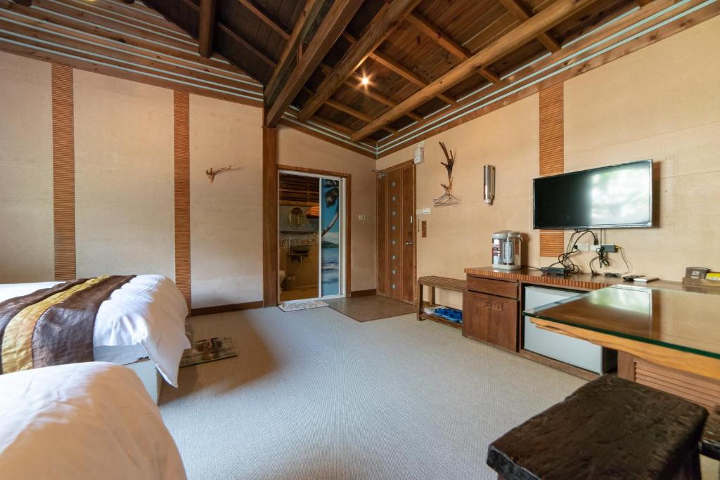 TV a/nebo společenská místnost v ubytování Shankou Hotspring Hotel