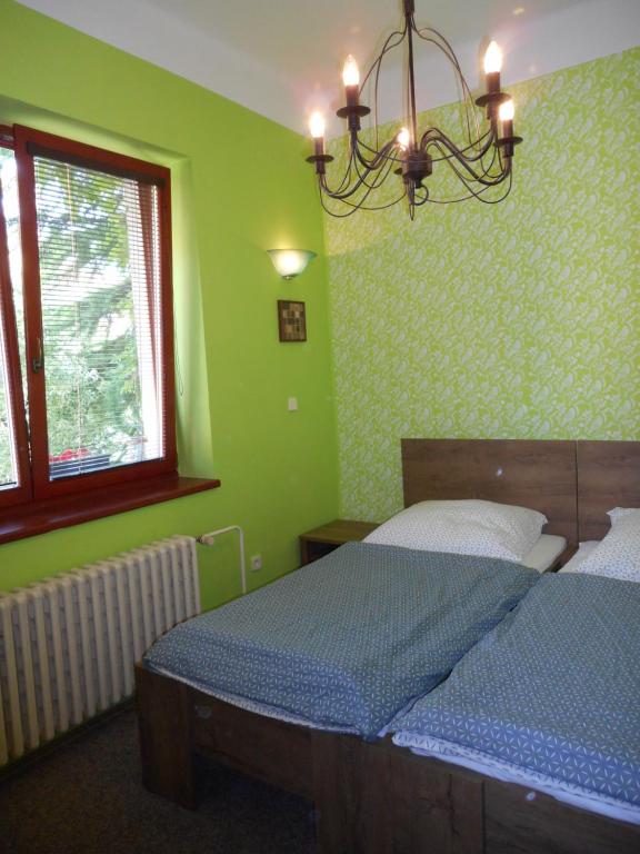 Postel nebo postele na pokoji v ubytování Apartmán Dobrá Naděje