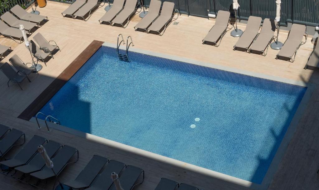 Bazén v ubytování Rosamar Es Blau 4*s - Adults Only nebo v jeho okolí