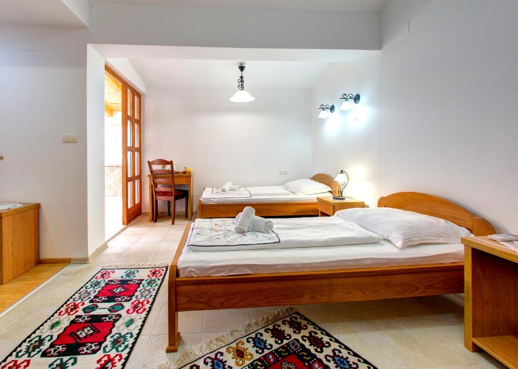 Postel nebo postele na pokoji v ubytování Hotel Almira