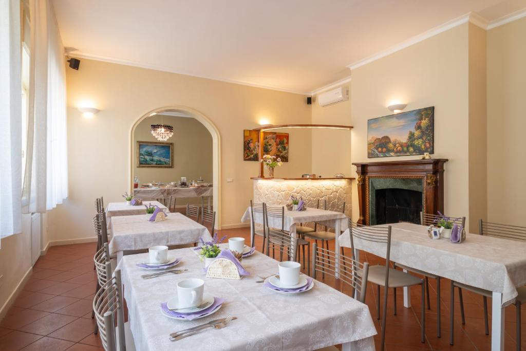 Posezení v ubytování Villa Domus Salento Suites & Rooms con parcheggio privato in loco