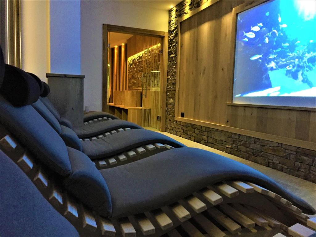 TV a/nebo společenská místnost v ubytování Residence Hotel Miralago