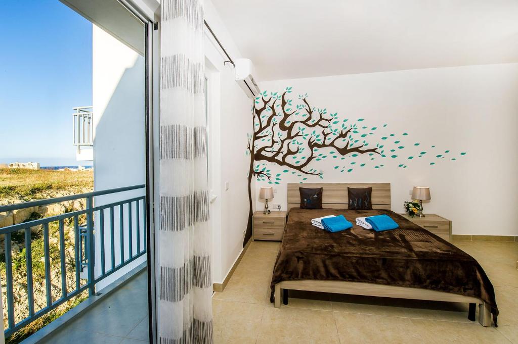 Voodi või voodid majutusasutuse Hillock Residence Apartments toas