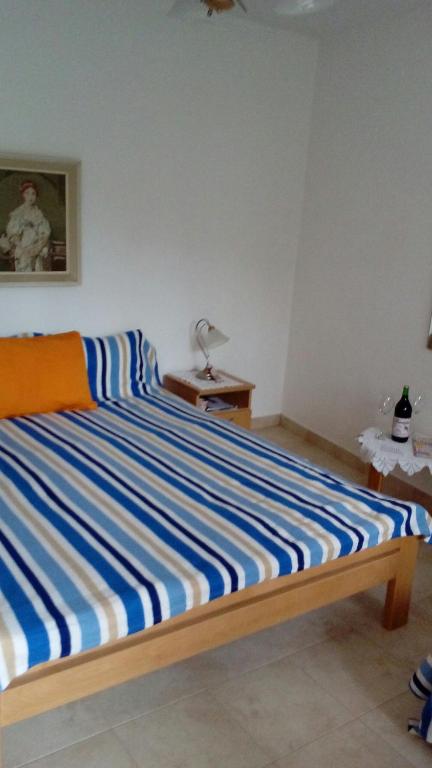 Postel nebo postele na pokoji v ubytování Guest House Roza