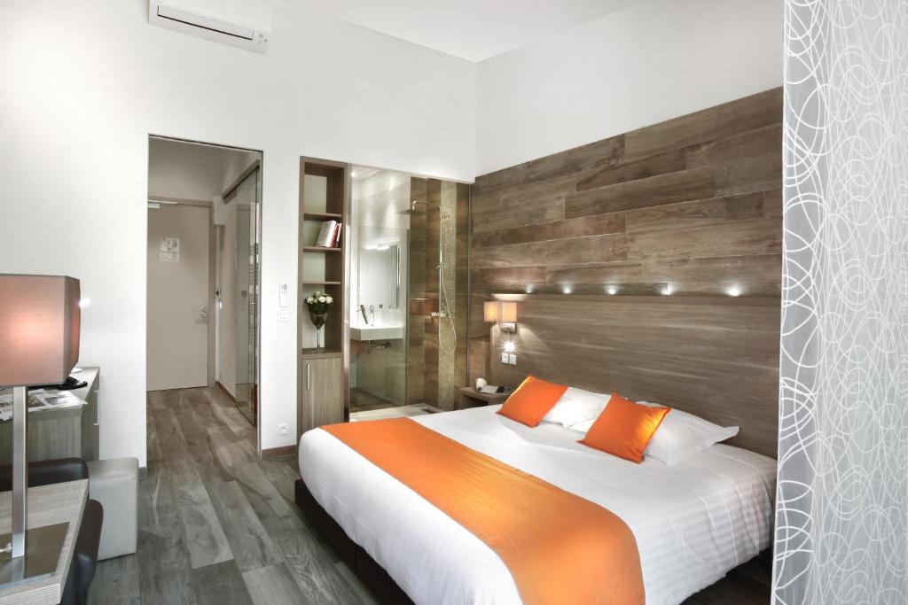 Postel nebo postele na pokoji v ubytování Seventeen Hotel