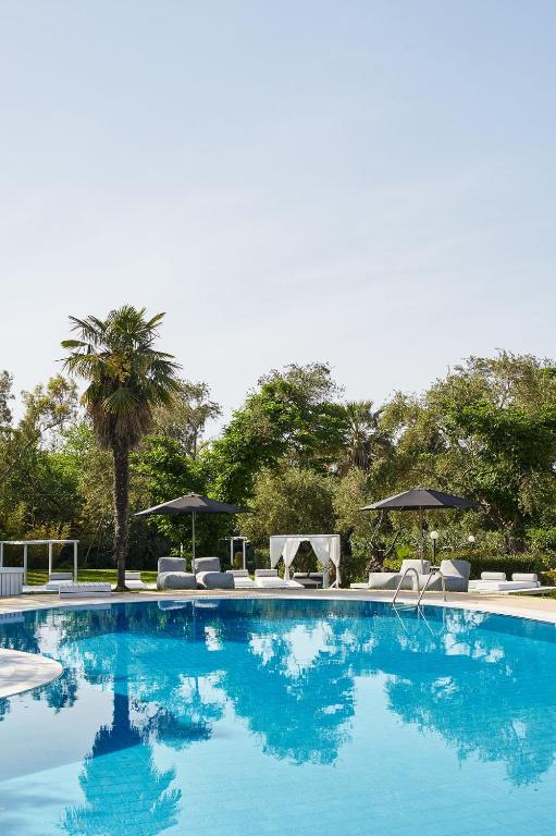 Bazén v ubytování Mr and Mrs White Corfu Couples Retreat Adults Only nebo v jeho okolí