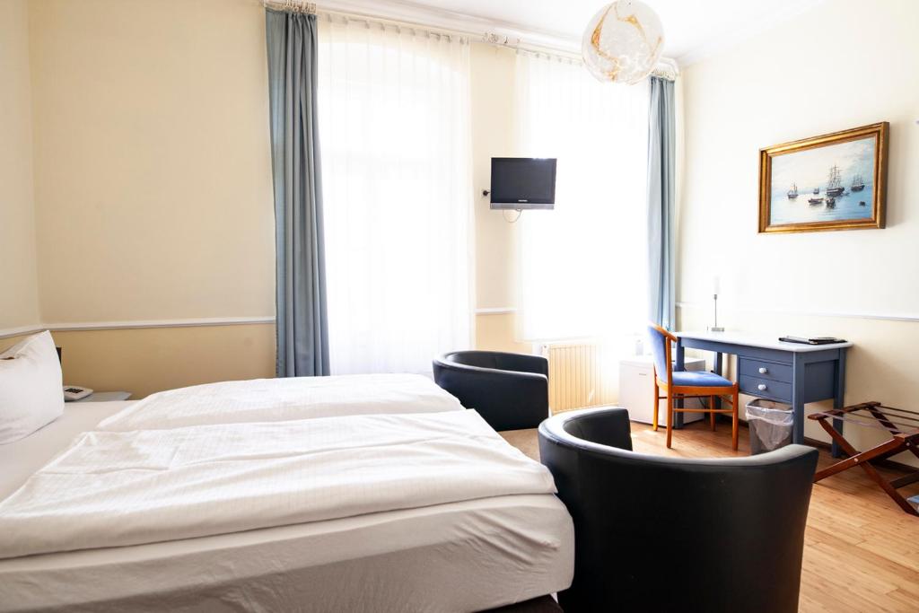 Postel nebo postele na pokoji v ubytování Hotel Silesia
