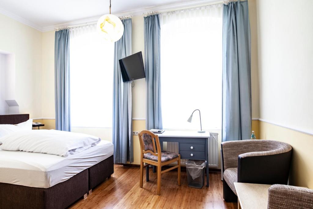 Postel nebo postele na pokoji v ubytování Hotel Silesia