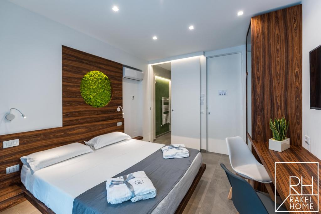 A bed or beds in a room at B&B Rakel Home