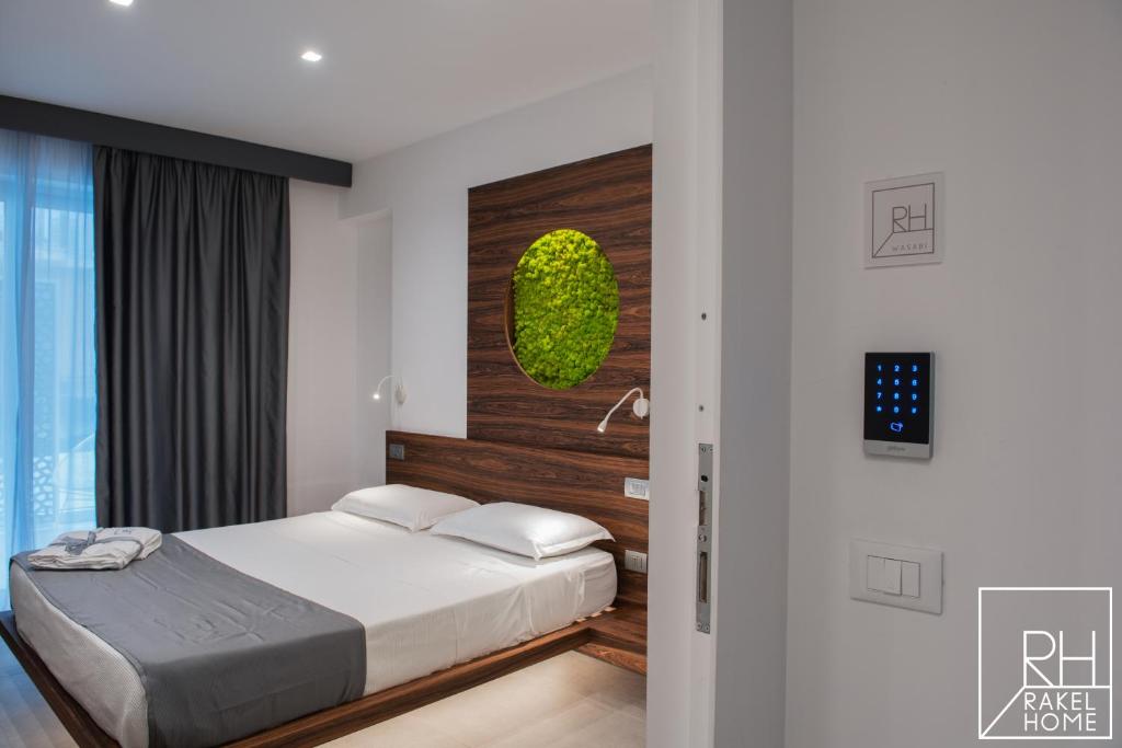 A bed or beds in a room at B&B Rakel Home