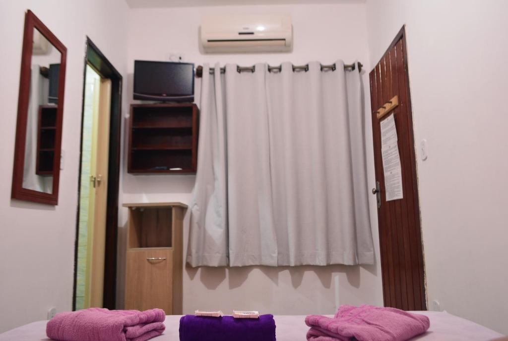 Cama ou camas em um quarto em Cabo Frio Fun Hostel