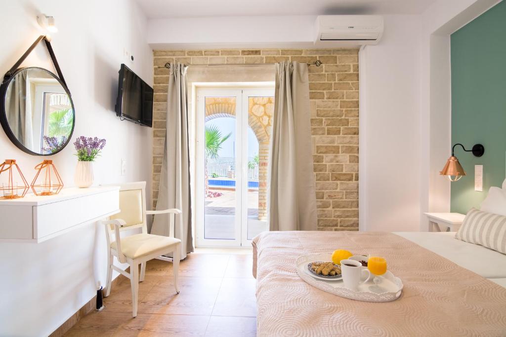 Posteľ alebo postele v izbe v ubytovaní Aristidis country villa-anesis