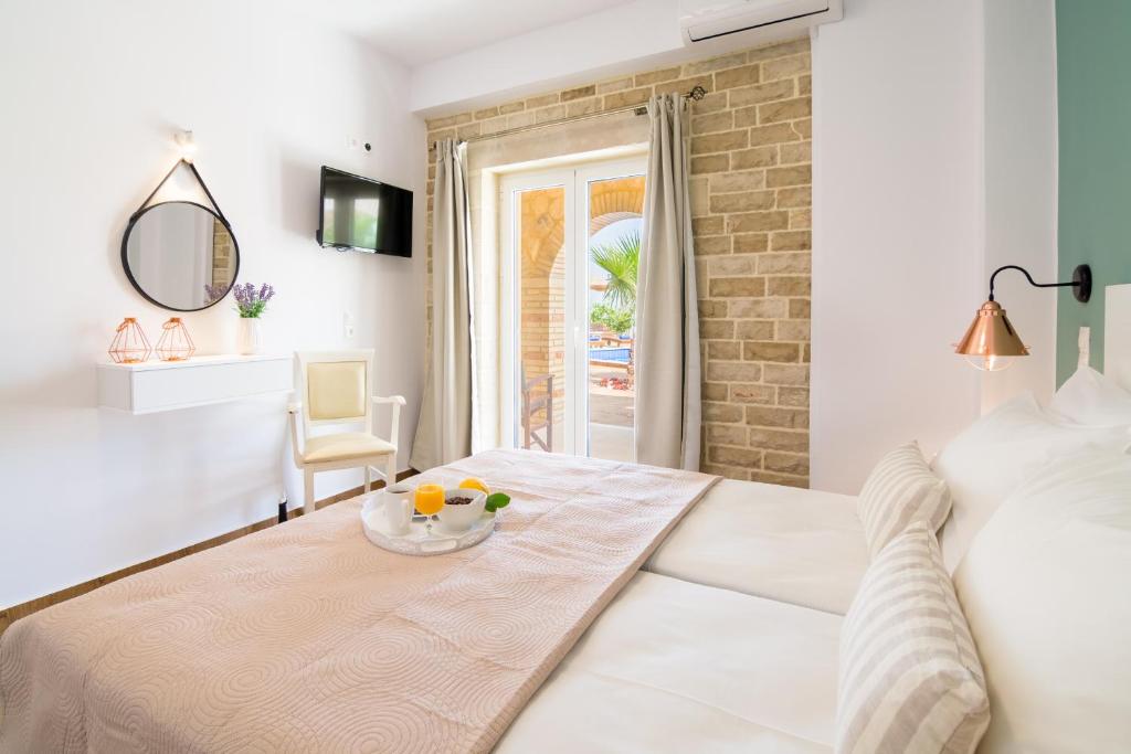 Posteľ alebo postele v izbe v ubytovaní Aristidis country villa-anesis